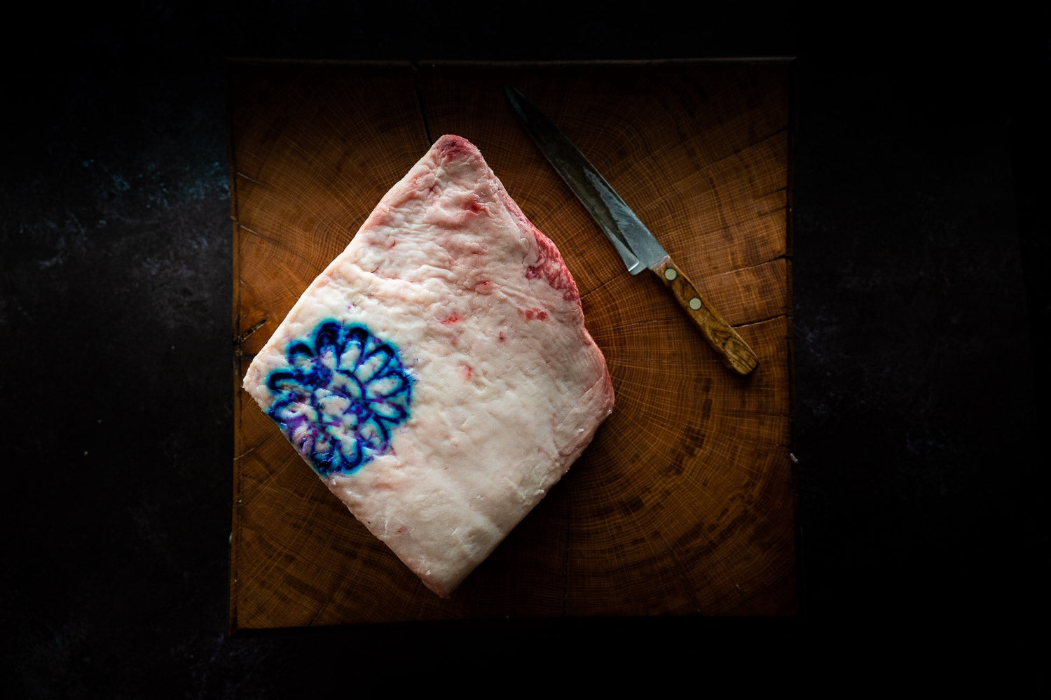 Japanese A5 Kobe beef ribeye showing dense marbling