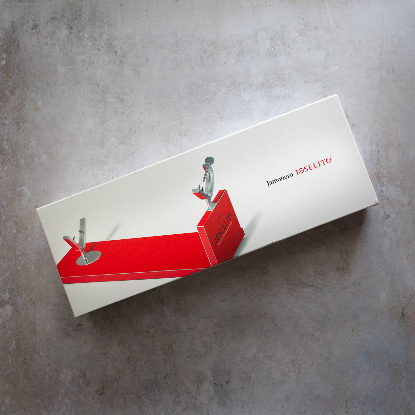 White box with red design and 'Joselito' branding on a gray surface