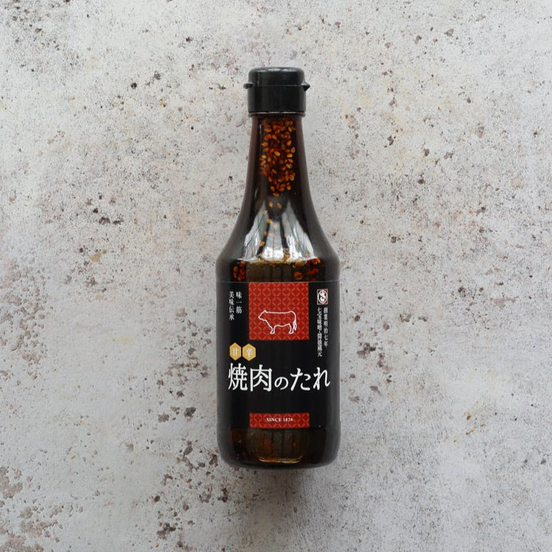 Yakiniku Sauce 300ml bottle by Sato Brewery with red label and sesame seeds, premium Japanese BBQ sauce from FINE & WILD UK.
